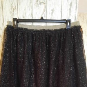 Knee length metallic gold skirt